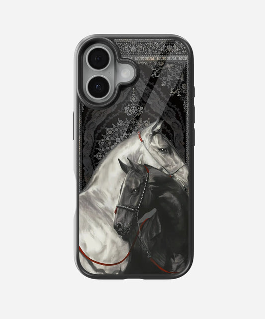 Black and white persian horses